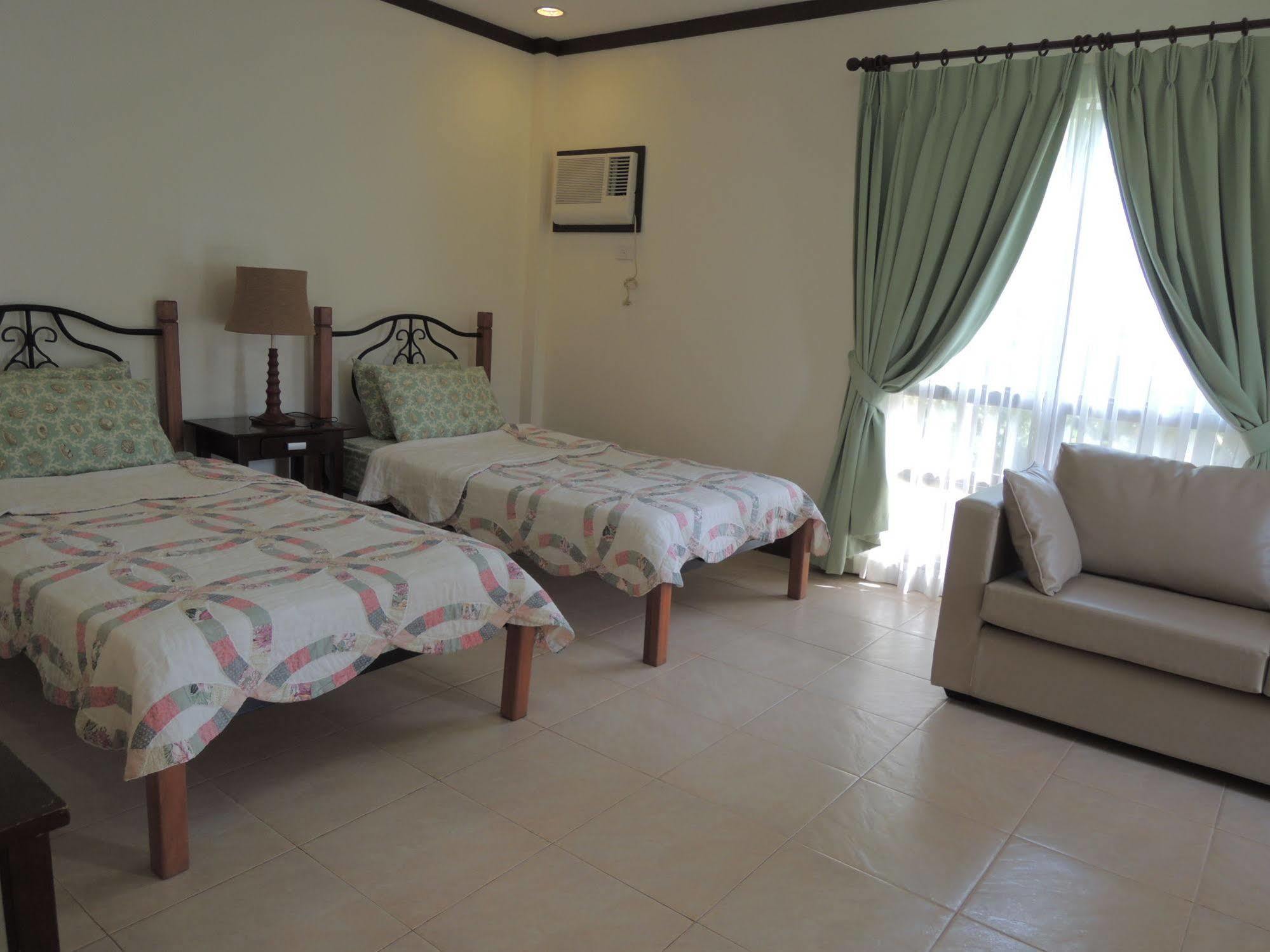 Palms Seaside Inn And Resort Medellin ภายนอก รูปภาพ